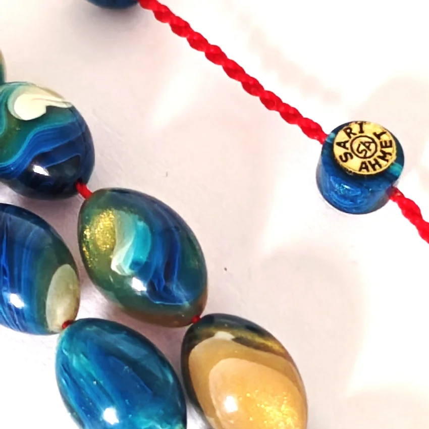 Sıkma Kehribar Hareli Açık Mavi Arpa Kesim Tesbih HA20 - 2